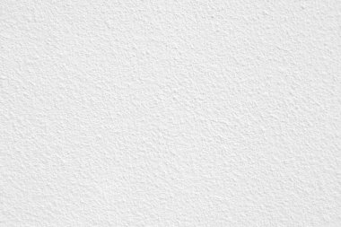 Seamless texture of white cement wall a rough surface, with space for text, for a background..	