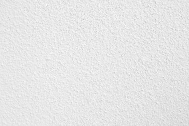Seamless texture of white cement wall a rough surface, with space for text, for a background..	
