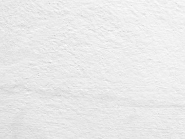 Beyaz beton duvarın pürüzsüz dokusu kaba bir yüzey, metin için boşluk, arkaplan için alan.