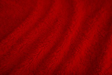 Red clean wool texture background. light natural sheep wool. red seamless cotton. texture of fluffy fur for designers christmas day. close-up fragment red wool carpet..	