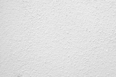 Seamless texture of white cement wall a rough surface, with space for text, for a background..	