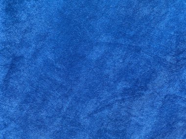 Arka plan olarak kullanılan açık mavi kadife kumaş dokusu. Yumuşak ve pürüzsüz tekstil malzemelerinin açık mavi kumaş arka planı. Metin için boşluk var.