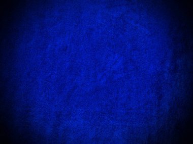 Dark blue velvet fabric texture used as background. Empty dark blue fabric background of soft and smooth textile material. There is space for text.	