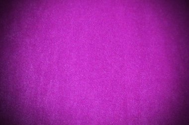 Purple velvet fabric texture used as background. Empty purple fabric background of soft and smooth textile material. There is space for text.	