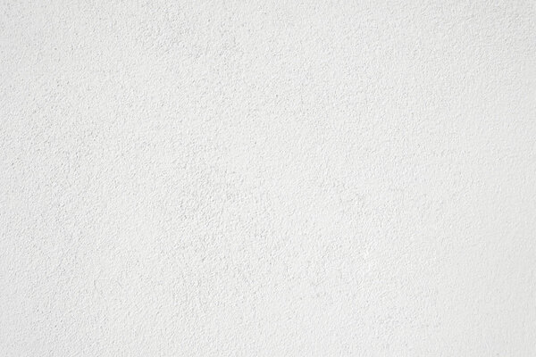 Seamless texture of white cement wall a rough surface, with space for text, for a background..	