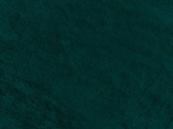 Dark green old velvet fabric texture used as background. Empty green fabric background of soft and smooth textile material. There is space for text..	