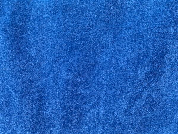 Light blue velvet fabric texture used as background. Empty light blue fabric background of soft and smooth textile material. There is space for text.