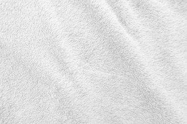 Beyaz, temiz yün dokusu arka planda. hafif doğal koyun yünü. Beyaz, pürüzsüz pamuk. Tasarımcılar için tüylü kürk dokusu. yakın plan beyaz yün halı..