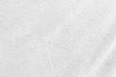 Beyaz, temiz yün dokusu arka planda. hafif doğal koyun yünü. Beyaz, pürüzsüz pamuk. Tasarımcılar için tüylü kürk dokusu. yakın plan beyaz yün halı..