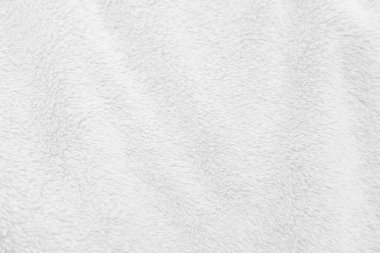 Beyaz, temiz yün dokusu arka planda. hafif doğal koyun yünü. Beyaz, pürüzsüz pamuk. Tasarımcılar için tüylü kürk dokusu. yakın plan beyaz yün halı..