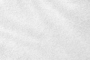 Beyaz, temiz yün dokusu arka planda. hafif doğal koyun yünü. Beyaz, pürüzsüz pamuk. Tasarımcılar için tüylü kürk dokusu. yakın plan beyaz yün halı..