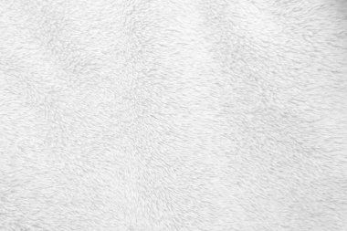 Beyaz, temiz yün dokusu arka planda. hafif doğal koyun yünü. Beyaz, pürüzsüz pamuk. Tasarımcılar için tüylü kürk dokusu. yakın plan beyaz yün halı..