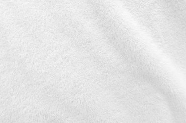 Beyaz, temiz yün dokusu arka planda. hafif doğal koyun yünü. Beyaz, pürüzsüz pamuk. Tasarımcılar için tüylü kürk dokusu. yakın plan beyaz yün halı..