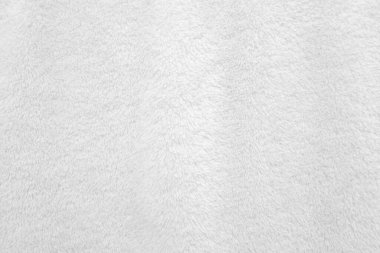 Beyaz, temiz yün dokusu arka planda. hafif doğal koyun yünü. Beyaz, pürüzsüz pamuk. Tasarımcılar için tüylü kürk dokusu. yakın plan beyaz yün halı..