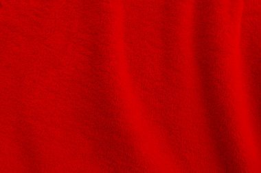 Red clean wool texture background. light natural sheep wool. red seamless cotton. texture of fluffy fur for designers. close-up fragment red wool carpet.	