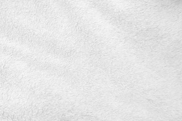 Beyaz, temiz yün dokusu arka planda. hafif doğal koyun yünü. Beyaz, pürüzsüz pamuk. Tasarımcılar için tüylü kürk dokusu. yakın plan beyaz yün halı..