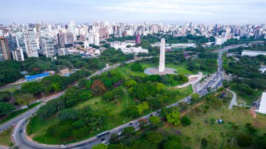 Aerial view of Ibirapuera Park in So Paulo, SP. Residential buildings around. Lake in Ibirapuera Park.