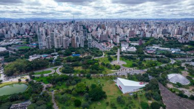 Aerial view of Ibirapuera Park in Sao Paulo, SP. Residential buildings around. Lake in Ibirapuera Park.
