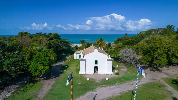 Aerial view of Trancoso, Porto Seguro, Bahia, Brazil. Small chapel in the historic center of Trancoso, called Quadrado. With the sea in the background.