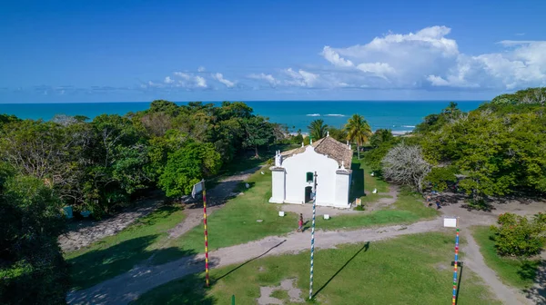 Aerial view of Trancoso, Porto Seguro, Bahia, Brazil. Small chapel in the historic center of Trancoso, called Quadrado. With the sea in the background.