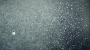 slow motion of bubbling water in detail. macro plan. background