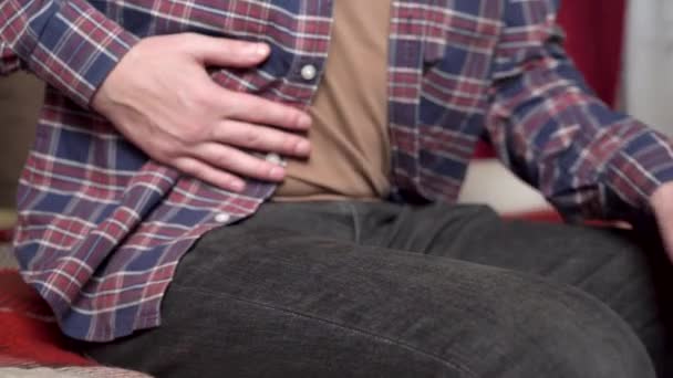 Young Man Holds His Hand His Sore Stomach Second Hand — Stock Video