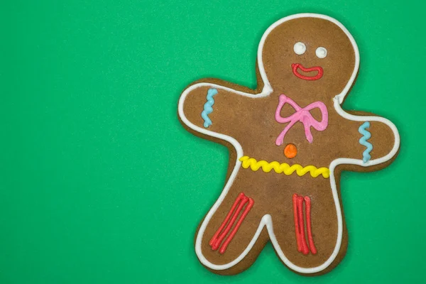 Christmas Gingerbread Man Decorated Coloured Icing Isolated Green Background Copy — Stock Photo, Image