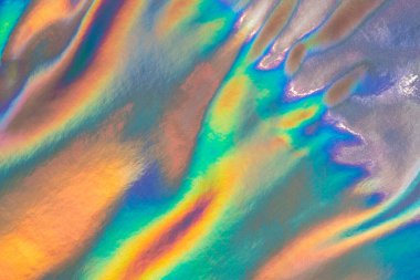 Yanardöner holografik soyut çılgın doku. Pastel renklerde girdaplı ve dalgalı arkaplan.