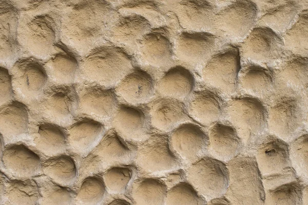 Textura Fachada Pedra Com Crateras Tipo Lua Fundo Bege Modelado — Fotografia de Stock