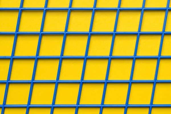 Arkaplan ya da pankart olarak geometrik ızgara dokusu. Çapraz paralel mavi plastik çizgiler.