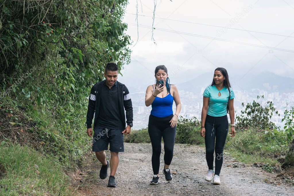 three young Latino influencers going out of town to clear their minds and record new content for their social networks. Colombian coffee growing region
