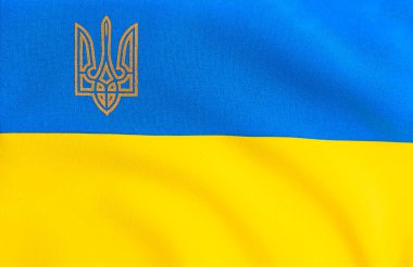 Ukrayna bayrağı yakında. Ukrayna amblemi. Bayrak çerçevesi, mavi ve sarı. Metin için yer