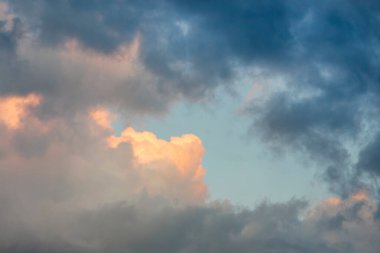 Multicolored clouds at sunset. Morning sunlight, clouds texture