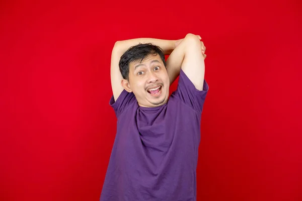 Asian Man Wearing Purple Shirt Stretching His Arms Very Happy — Stock Photo, Image