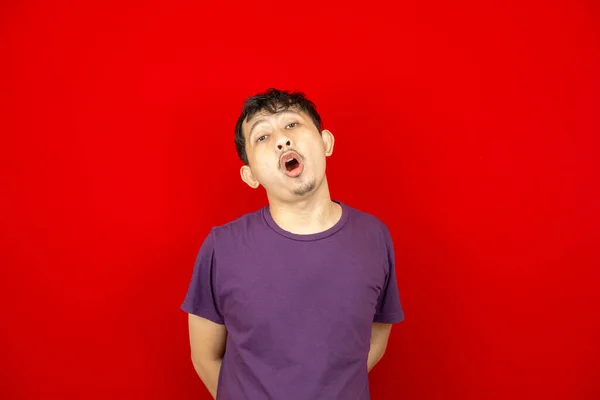 Studio Portrait Asian Young Man Feeling Lazy Shocked Red Background — Stock Photo, Image