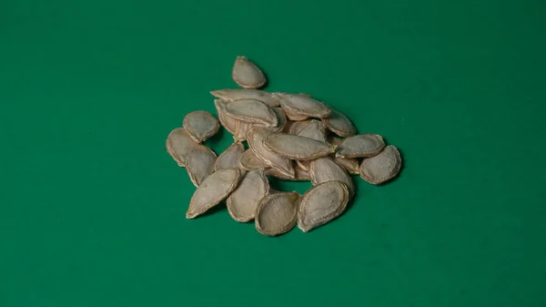Mucchio Semi Zucca Sfondo Verde — Foto Stock