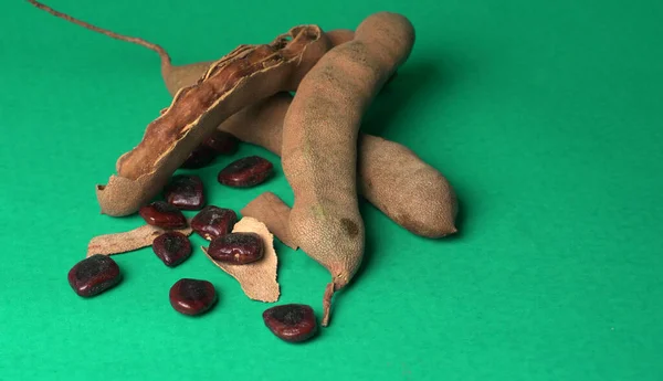 Dry green pigeon, the pigeon peas on green background, Toor Dal.