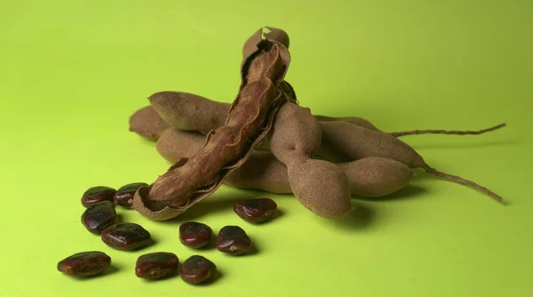 Dry green pigeon, the pigeon peas on green background, Toor Dal.