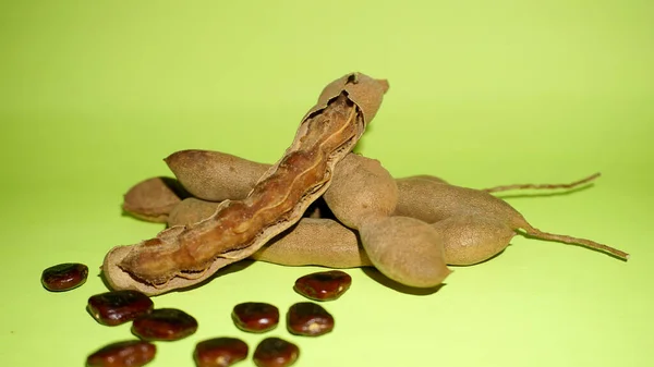 Dry green pigeon, the pigeon peas on green background, Toor Dal.