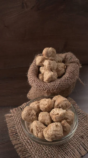 Sack Bowl Raw Soya Chunks Wooden Background Healthy Nutritious Soybean — стоковое фото