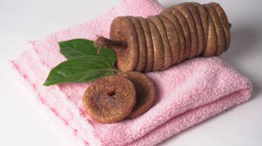 Fresh figs or anjeer fruits healthy vegan food concept organic dry fruits on colorful cloth background