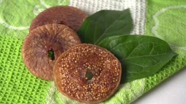 Fresh figs or anjeer fruits healthy vegan food concept organic dry fruits on colorful cloth background