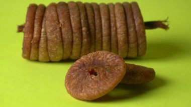 Fresh figs or anjeer fruits healthy vegan food concept organic dry fruits on green background.