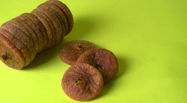 Fresh figs or anjeer fruits healthy vegan food concept organic dry fruits on green background.