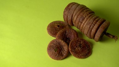 Fresh figs or anjeer fruits healthy vegan food concept organic dry fruits on green background.
