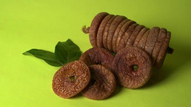 Fresh figs or anjeer fruits healthy vegan food concept organic dry fruits on green background.