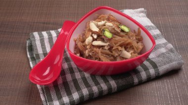 Bowl fo Bombay mix 'i veya Chanachur veya Chiwda veya Farsan Hindistan' ın popüler çay saatleri yemekleri.