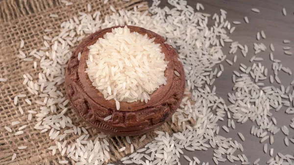 Uncooked Dry Rice Clay Brown Bowl Wooden Table Healthy Food — Stock Photo, Image