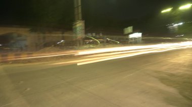 Gece vakti bulanık sokak ışıkları, soyut arkaplan 