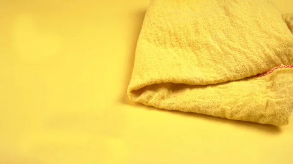 Yellow Towel Yellow Background — Zdjęcie stockowe